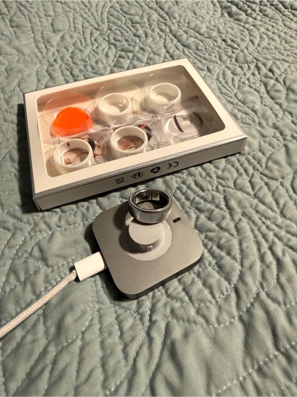 Oura Silver Ring with White Covers